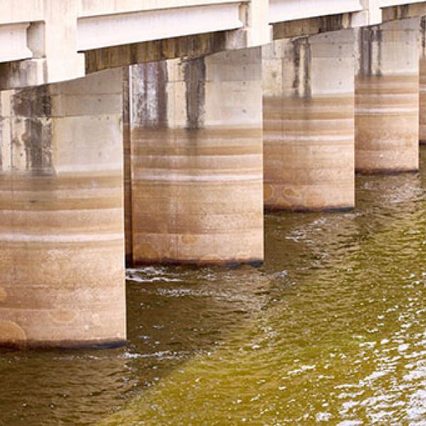 Piers at Copeton Dam with markings indicating changing water levels.